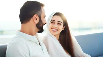 AI generated A couple happily sitting on a couch, both smiling and radiating joy. Generative AI photo