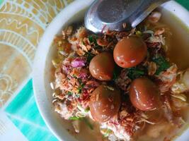 Close up of delicious Indonesian soto food. Stall food. photo