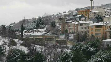 top view of Snowfall on buildings in istanbul city video