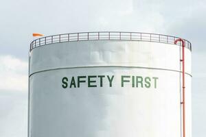 Message SAFETY FIRST on white water tank photo