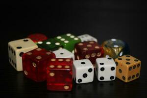 Pile Of Different Colored and Shaped  Dice photo