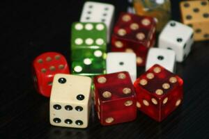 Pile Of Different Colored and Shaped  Dice photo