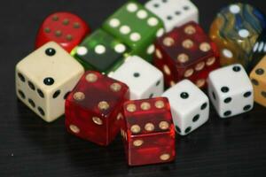 Pile Of Different Colored and Shaped  Dice photo