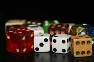 Pile Of Different Colored and Shaped  Dice photo