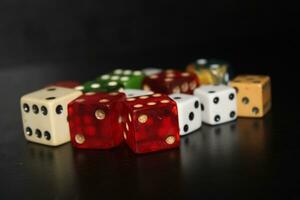 Pile Of Different Colored and Shaped  Dice photo