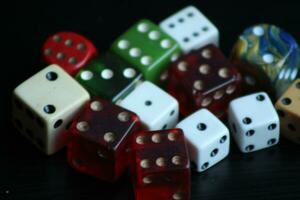 Pile Of Different Colored and Shaped  Dice photo