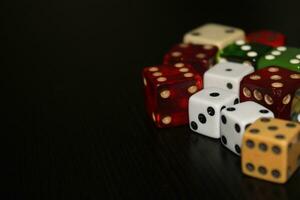 Pile Of Different Colored and Shaped  Dice photo