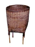 Woven basket trash can rattan handmade isolated on white background photo