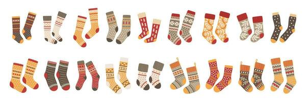 Vector pairs of colorful socks icons set.