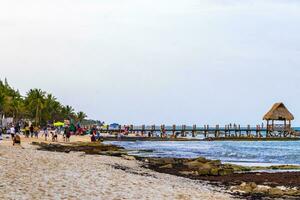 Playa del Carmen Quintana Roo Mexico 2023 Tropical Caribbean beach clear turquoise water jetty Playa Xcalacoco Mexico. photo