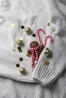 Christmas composition in white knitted background photo