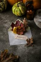 Autumn November still life with letter photo