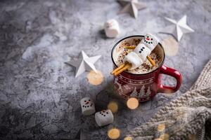 Hot chocolate with snowman marshmallow photo