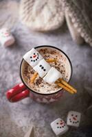 Hot chocolate with snowman marshmallow photo