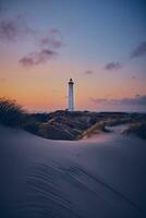 Lighthouse Lyngvig Fyr at the danish north sea coast photo