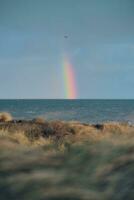 arco iris terminado norte mar foto