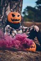 Person with pumpkin for head and smoke bomb photo