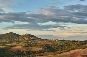 Tuscany hills in warm evening light photo