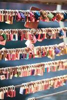 Love locks at a bridge in Luneburg, Germany photo