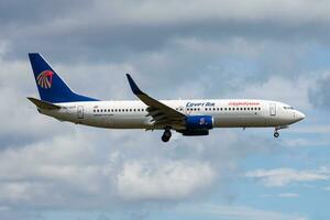 Amsterdam, Netherlands, 2014 - Egyptair passenger plane at airport. Schedule flight travel. Aviation and aircraft. Air transport. Global international transportation. Fly and flying. photo