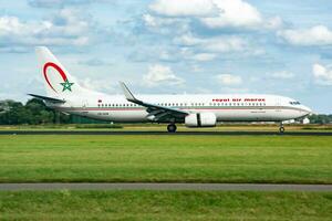 Amsterdam, Netherlands, 2014 - Royal Air Maroc passenger plane at airport. Schedule flight travel. Aviation and aircraft. Air transport. Global international transportation. Fly and flying. photo