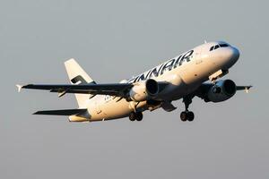 Vienna, Austria, 2018 - Finnair Airbus A319 OH-LVI passenger plane departure and take off at Vienna Airport photo