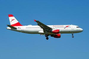 Vienna, Austria, 2018 - Austrian Airlines Airbus A320 OE-LBQ passenger plane arrival and landing at Vienna Airport photo