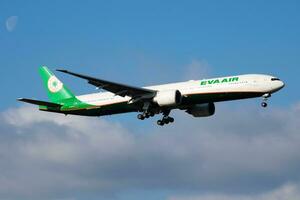 Vienna, Austria, 2018 - EVA Air Boeing 777-300ER B-16712 passenger plane arrival and landing at Vienna Airport photo