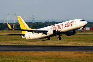 Vienna, Austria, 2018 - Pegasus Airlines Boeing 737-800 TC-CPD passenger plane departure and take off at Vienna Airport photo