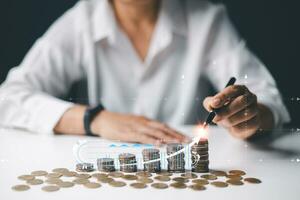 Businesswoman working with modern computer calculator virtual dashboard analyzing finance sales data and economic growth graph chart and account report technology. photo