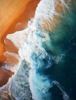 ai generado aéreo ver de Oceano olas en arenoso playa generado con ai foto