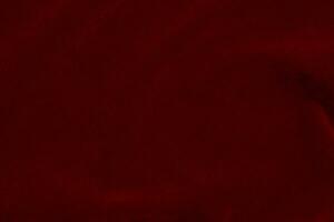 rojo seda tela textura usado como antecedentes. rojo pana tela antecedentes de suave y suave textil material. aplastada terciopelo .lujo escarlata para terciopelo.. foto