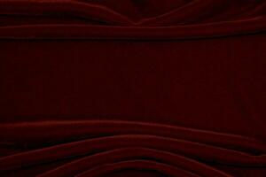 red velvet fabric texture used as background. Empty red fabric background of soft and smooth textile material. There is space for text... photo