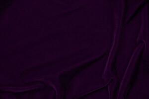 Purple velvet fabric texture used as background. Empty purple fabric background of soft and smooth textile material. There is space for text.. photo