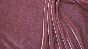 rosado terciopelo tela textura usado como antecedentes. vacío rosado tela antecedentes lujo de suave y suave textil material. allí es espacio para texto. foto