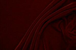 red velvet fabric texture used as background. Empty red fabric background of soft and smooth textile material. There is space for text... photo