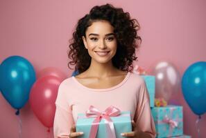 AI generated young woman with presents in hand smiling on pink background photo