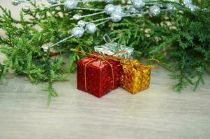 Wrapped gifts under a Christmas tree. Christmas holiday picture with copyspace photo