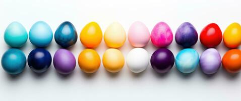 AI generated colorful easter eggs in rainbow, floral arrangement, and white background photo