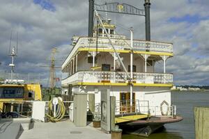 Alexandria, VA, USA 2023. Paddle steamer on the Potomac river in Old Town waterfront in Alexandria VA photo