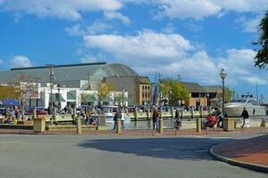 Annapolis, MD, USA 2023.People walking around the waterfront dock area in Annapolis MD photo