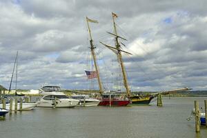 Alexandria, VA, USA 2023. old sail boat moared at the Old Town waterfront in Alexandria VA photo