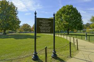 Arlington Cemetery, VA, USA 2023. Welcome sign and rules at the entrance to Arlington Cemetery in Virginia photo