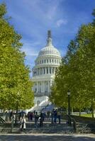 Washington DC, USA, 2023. People on the steps outside the Capital building in the heart of Washington DC photo