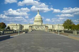 Washington DC, USA, 2023. Outside the U.S. Capitol building with the dome of democracy standing out over Washington DC photo