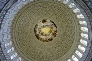 Washington DC, USA, 2023. The Capitol Rotunda ceiling, a large domed circular room located in the center of the U.S. Capitol. photo