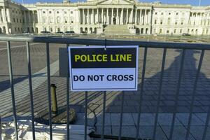 Washington DC, USA, 2023. Placard saying Police Line - Do Not Cross placard at the Capitol building in Washington DC photo