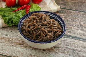 Asian cuisine - soba in the bowl photo