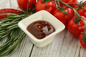 Tomato barbecue sauce on the bowl photo