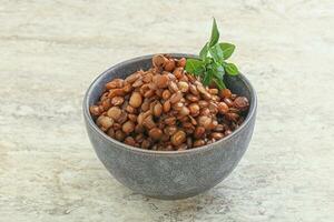 Boiled lentil in the bowl photo